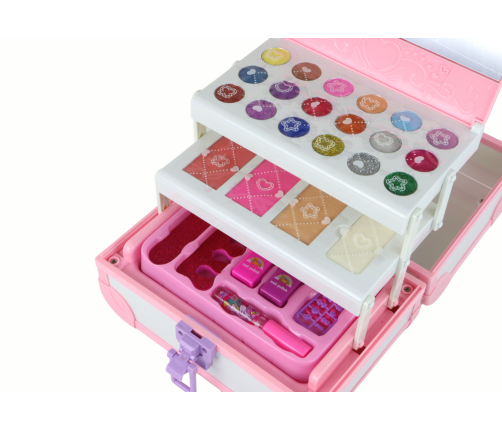 Set of beauty cosmetics for make-up doing nails in a pink case