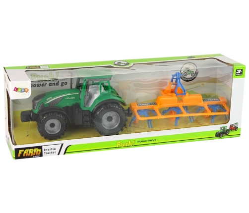 Green Tractor with Orange and Blue Rake Friction Drive