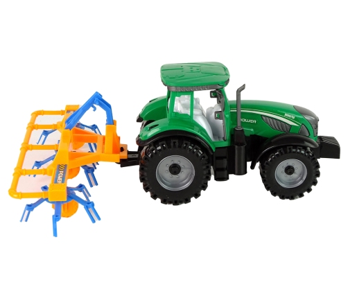 Green Tractor with Orange and Blue Rake Friction Drive