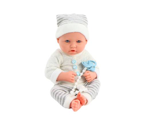 Baby doll in white and gray striped clothes, hat, pacifier, quilt