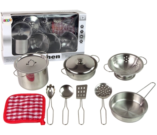 A set of pots and kitchen accessories for children