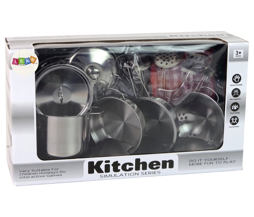 A set of pots and kitchen accessories for children