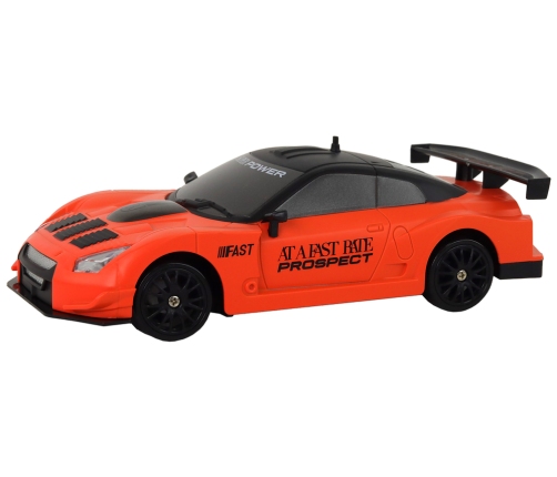 Remote Controlled Sports Car R/C 1:24 Orange Interchangeable Wheels