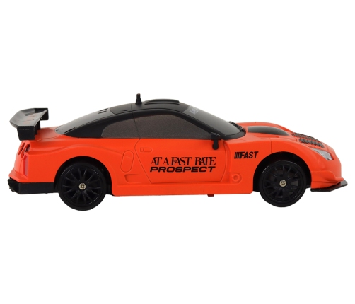 Remote Controlled Sports Car R/C 1:24 Orange Interchangeable Wheels