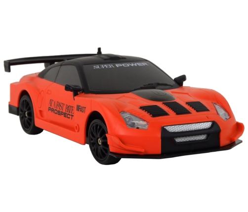 Remote Controlled Sports Car R/C 1:24 Orange Interchangeable Wheels