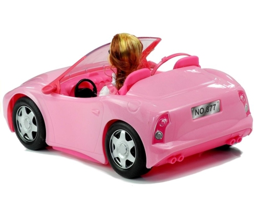 Doll Travelling with a Cabrio Car