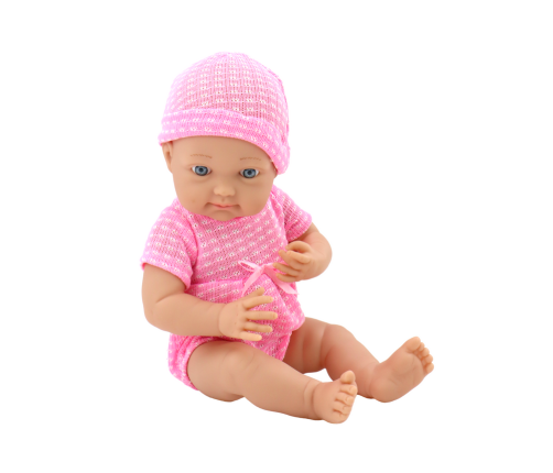 Baby doll in pink clothes, hat, pacifier, and blanket