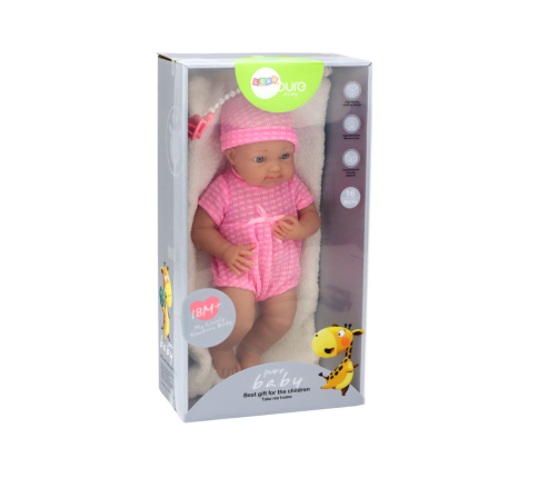 Baby doll in pink clothes, hat, pacifier, and blanket