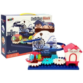 A set of blocks with a car slide, cogwheels on batteries