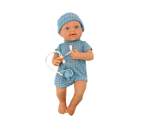 Baby doll in blue clothes, hat, pacifier, and blanket