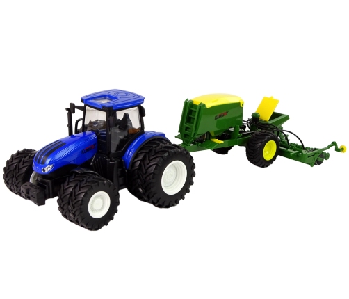 Blue tractor with baler