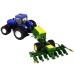 Blue tractor with baler