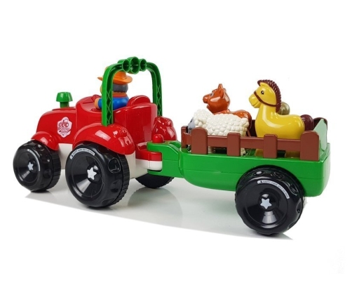 Tractor with a trailer, animals for babies, batteries, lights, sound