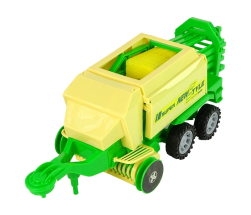 Green tractor with baler friction drive