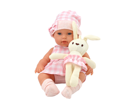 Baby doll in a bunny carrier in a pink checkered outfit