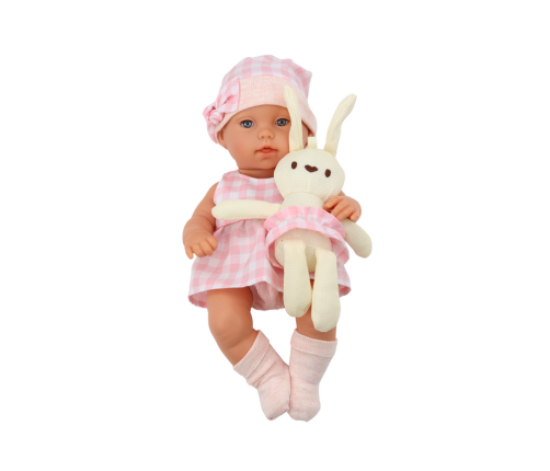 Baby doll in a bunny carrier in a pink checkered outfit