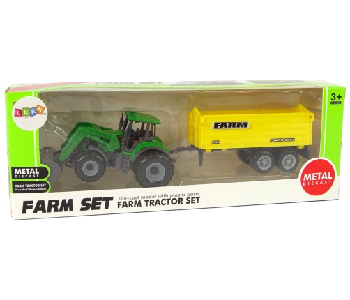 Small Green Tractor With Yellow Trailer