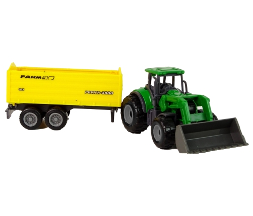 Small Green Tractor With Yellow Trailer