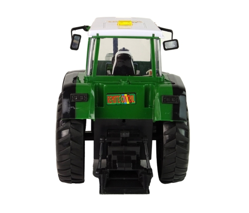 Green and black R/C Remote Controlled Tractor