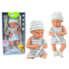 Baby doll in blue and white clothes, hat, pacifier, bib, quilt