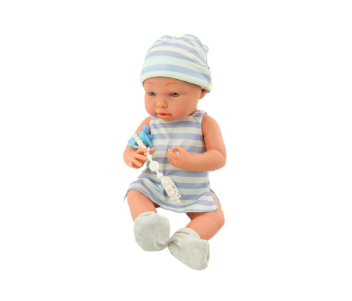 Baby doll in blue and white clothes, hat, pacifier, bib, quilt