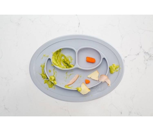 EZPZ Silikonowy Talerzyk Z Podkładką Mały 2w1 Mini Mat Pastelowa Szarość