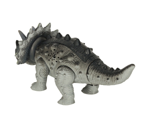 Tālvadības pults vadāms dinozaurs RC Triceratops staigā ar apgaismojumu rēca