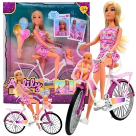 WOOPIE ROYAL Lalka Lily Rowerzystka Bobas w Foteliku Rower WOOPIE ROYAL Lalka Lily Rowerzystka Bobas w Foteliku Rower