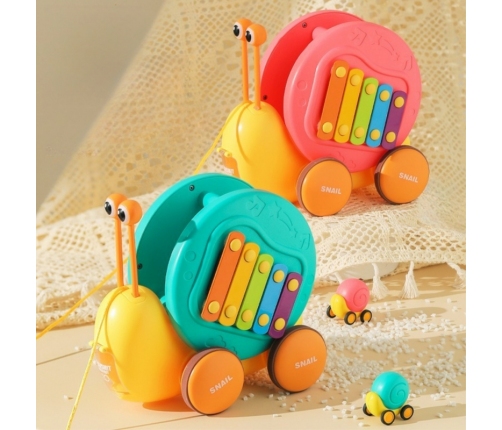 WOOPIE Ślimak do Ciągnięcia 4w1 Cymbałki Zębatki Sensoryczne Wyrzutnia + Małe Autko