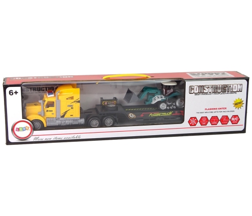 Radiovadāms kravas auto ar eksavatoru ar piekabi ar pulti