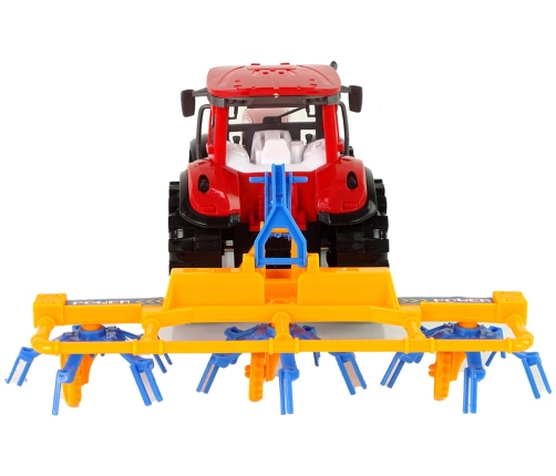 Red Tractor with Rake Friction Drive