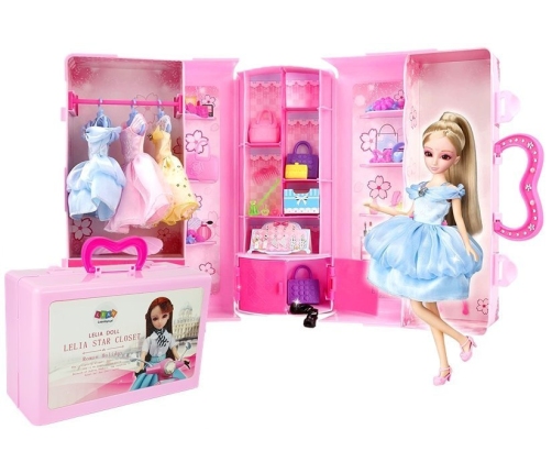 Doll, Model. Set of Clothes. Dressing. Jewelry in a Suitcase